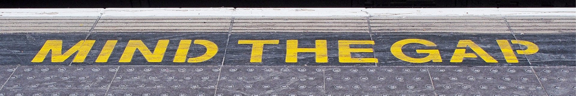 Mind the gap: painted on the floor at an underground station