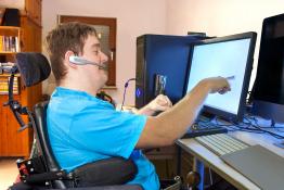 Office worker using assistive technology